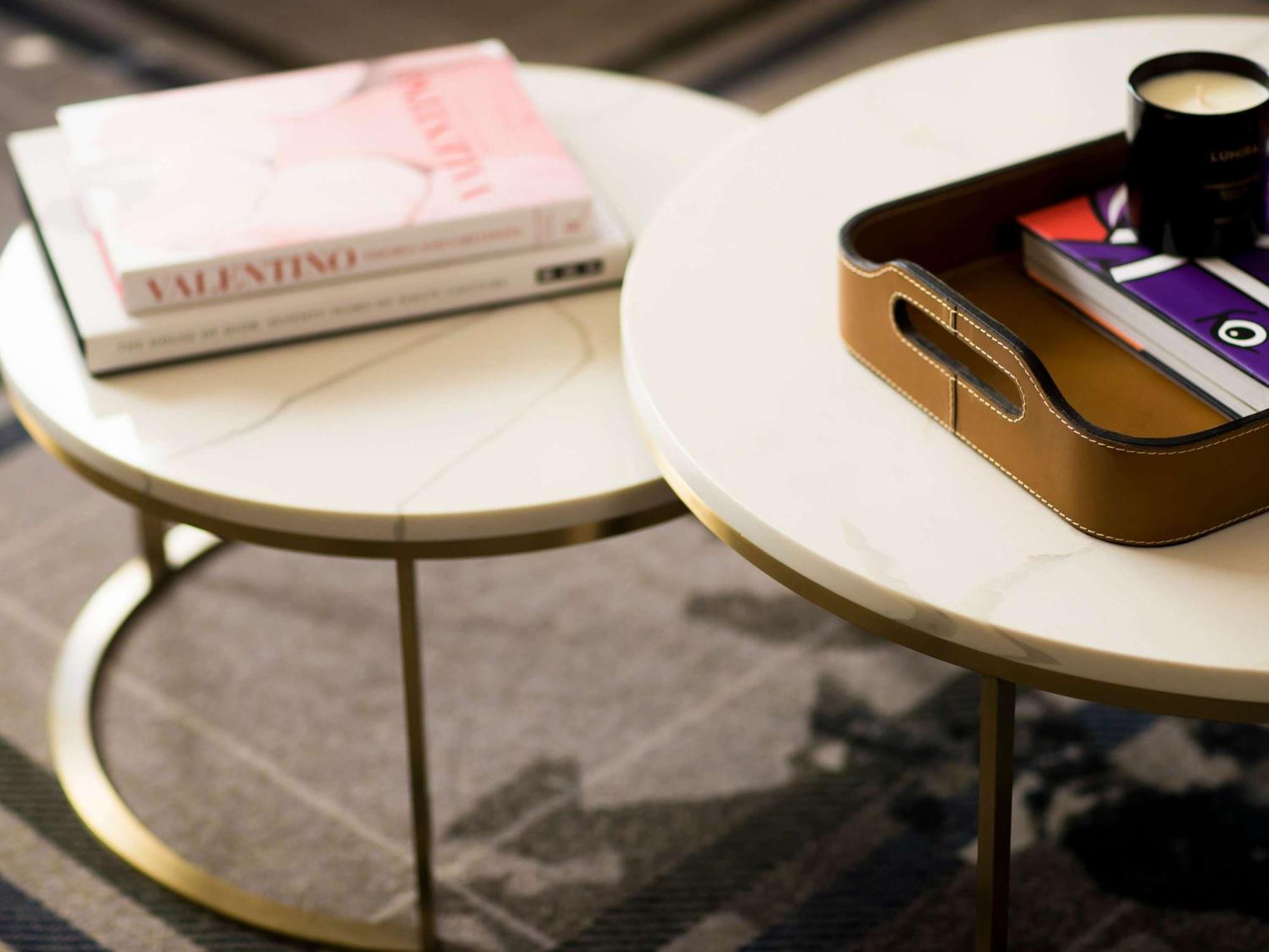 The William Inglis Mgallery Warwick Farm Buitenkant foto A coffee table with a book and a tray